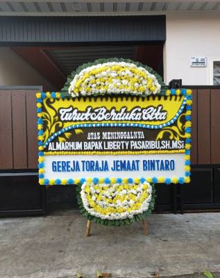 Papan Bunga Duka di Akesai
